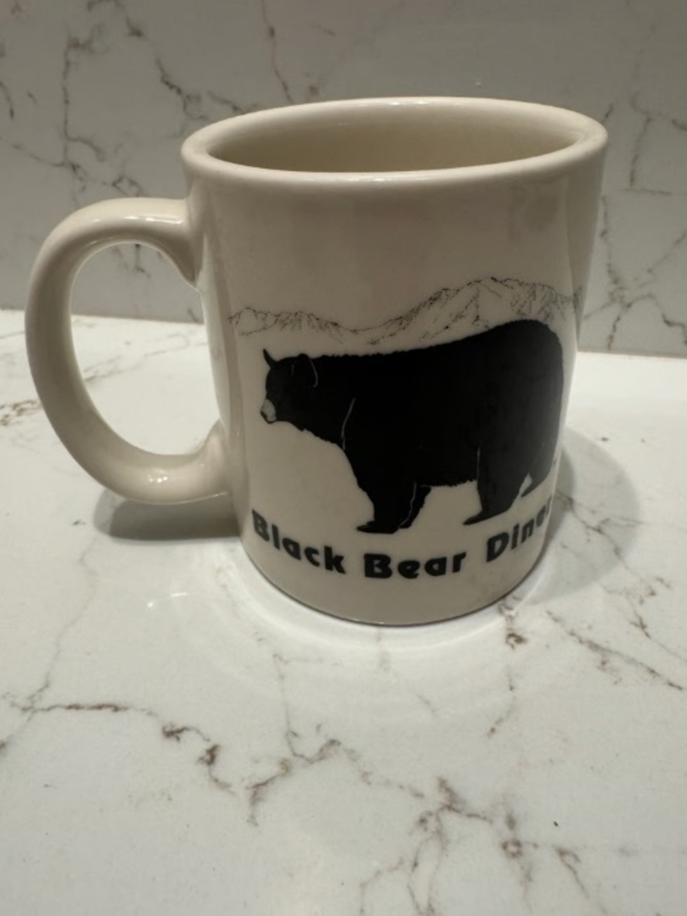 Black Bear Diner Ceramic Mug in Cream with Black Bear Graphic